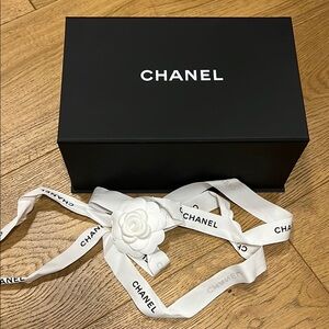 CHANEL Black Box with White Camellia Ribbon Accent